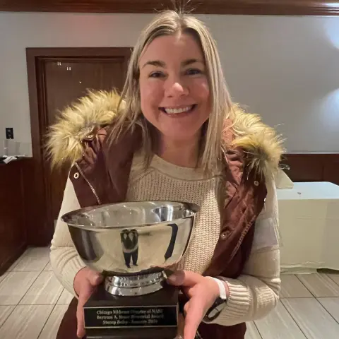 stacey-bales-awarded-for-outstanding-service-in-finishing